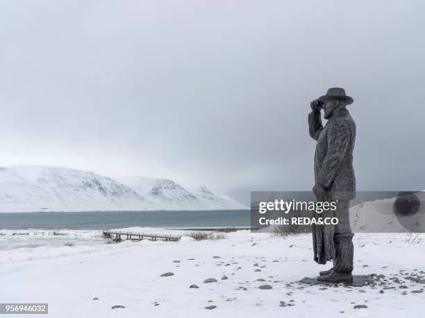 Statue of Jon Osmann in Skagafjoerdur looking across the fjord during winter. Europe. Northern Europe. Iceland. March.