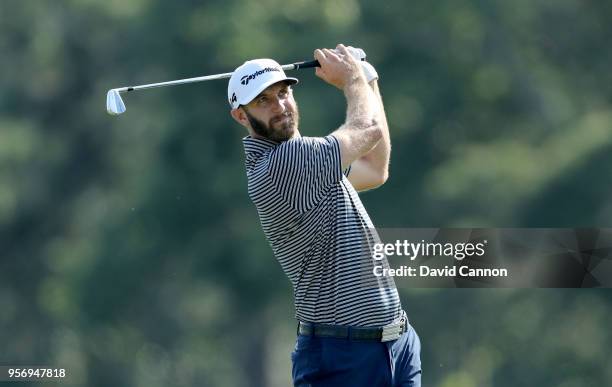 Dustin Johnson of the United States plays his second shot on the par 4, 14th hole during the first round of the THE PLAYERS Championship on the...