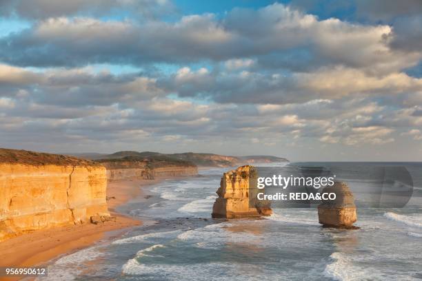 The coastline near Loch Ard Gorge. Looking towards the sea stacks called 12 Apostles. Great Ocean Road. Australia. Australia. Victoria. Port Campbell...