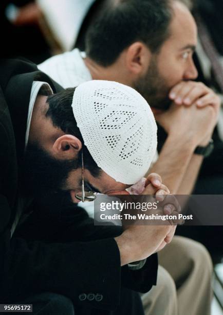 Imam Sheikh Anwar Al-Awlaki of the Dar Al Hijrah muslim mosque, , prays during a community press conference/prayer service on Septembe 12, 2001 in...