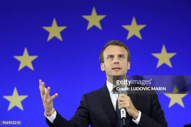 France's President Emmanuel Macron addresses students at the North Rhine-Westphalia technical university on May 10, 2018 in Aachen, western Germany....