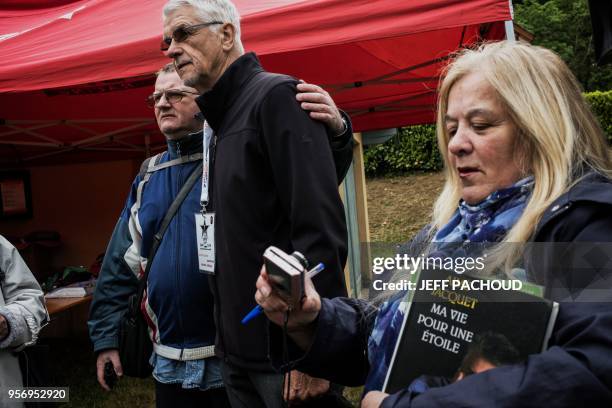 French Aime Jacquet , former coach of French national football team 1998 and world champion poses with inhabitants on May 10, 2018 in...