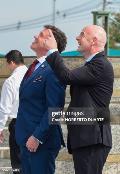 The president of the South American Football Confederation Alejandro Dominguez and FIFA's President Gianni Infantino, are pictured at the Conmebol's...