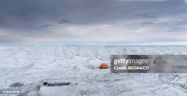 Camp on the ice cap. Landscape on the Greenland Ice Sheet near Kangerlussuaq. America. North America. Greenland. Denmark.