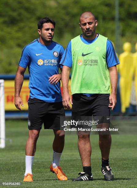 Eder Citadin Martins of FC Internazionale and Walter Samuel of Inter Forever look on during the FC Internazionale training session at the club's...