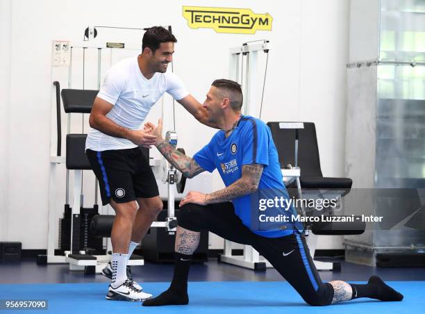 Eder Citadin Martins of FC Internazionale shakes hands with Marco Materazzi of Inter Forever during the FC Internazionale training session at the...