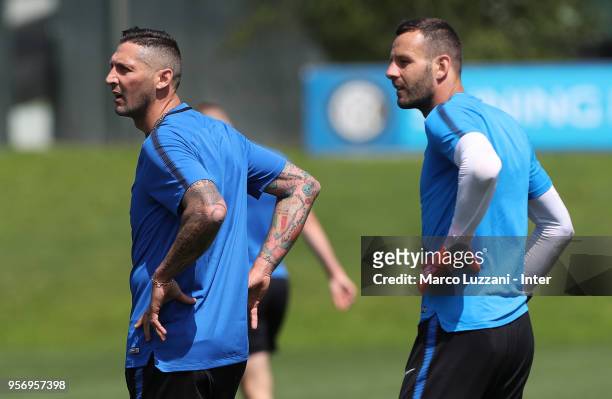 Marco Materazzi of Inter Forever and Samir Handanovic of FC Internazionale look on during the FC Internazionale training session at the club's...