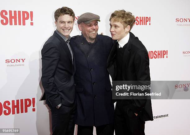 Actor Friedrich Muecke and Tom Zickler and actor Matthias Schweighoefer attend the premiere of 'Friendship' at CineMaxx at Potsdam Place on January...