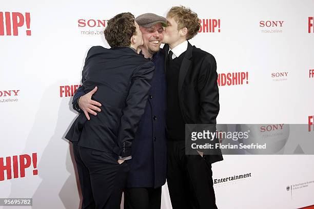 Actor Friedrich Muecke and Tom Zickler and actor Matthias Schweighoefer attend the premiere of 'Friendship' at CineMaxx at Potsdam Place on January...