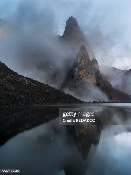 Mount Kenya national park in the highlands of central Kenya. A UNESCO world heritage site. The central part of Mount Kenya with Point John and Midget...