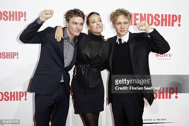 Actor Friedrich Muecke and actress Alicja Bachleda and actor Matthias Schweighoefer attend the premiere of 'Friendship' at CineMaxx at Potsdam Place...