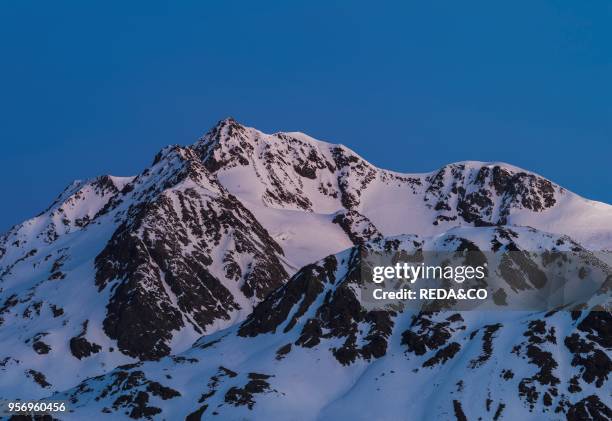 The Oetztal Alps during winter with ice and snow near Vent. Tyrol. Sunrise over Mount Wildspitze . One of the highest and most famous peaks in...