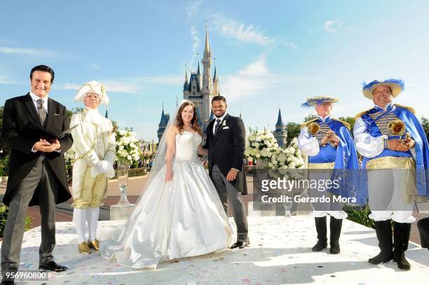 Alexis Preston and Jay Patel pose during their wedding ceremony at Magic Kingdom Walt Disney World Resort on May 10, 2018 in Lake Buena Vista,...
