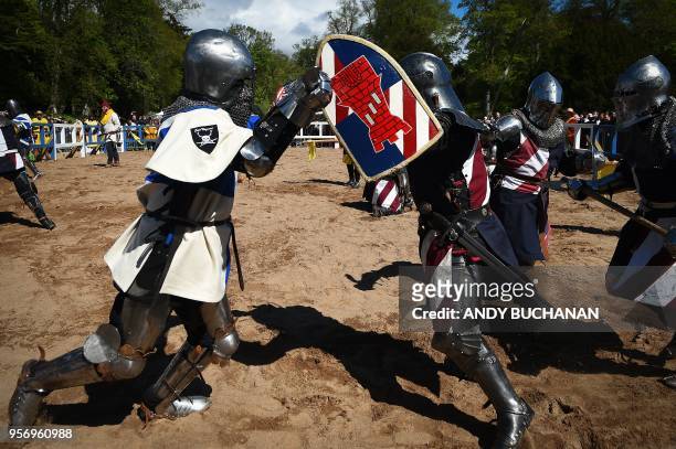Competitors battle in the 10 v 10 men's melee competition at the 2018 International Medieval Combat Federation World Championships at Scone Palace,...