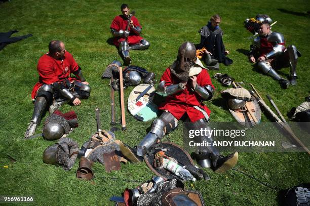 Competitors rest at the 2018 International Medieval Combat Federation World Championships at Scone Palace, Perthshire, Scotland on May 10, 2018. -...