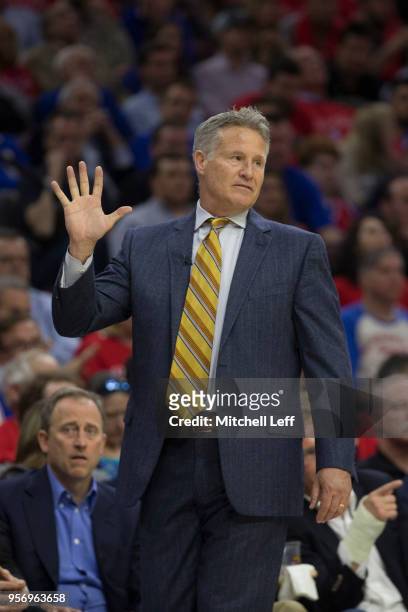 Brett Brown of the Philadelphia 76ers calls a play against the Boston Celtics during Game Four of the Eastern Conference Second Round of the 2018 NBA...