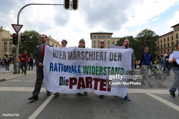 Banner of Die PARTEI. Several ten thousands demonstrate against the Bavarian Polizeiaufgabengesetz in Munich, Germany, on May 10, 2018. Experts say,...