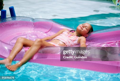 Tween Floating Inpool Girl Floating In Pool High-Res Stock Photo - Getty Images