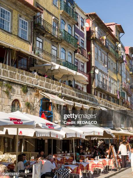 The quarter Ribeira at the old harbour in the old town with the iconic row of houses. City Porto at Rio Douro in the north of Portugal. The old town...