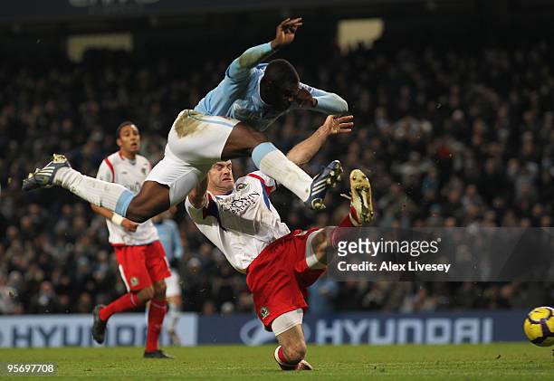 Ryan Nelsen of Blackburn Rovers is unable to prevent Micah Richards of Manchester City scoring the second goal during the Barclays Premier League...