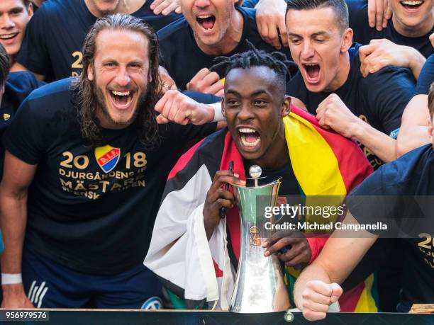 Tinotenda Kadawere holds the Swedish Cup trophy and poses for pictures with teammate Jonas Olsson after winning the Svenska Cupen Final between...