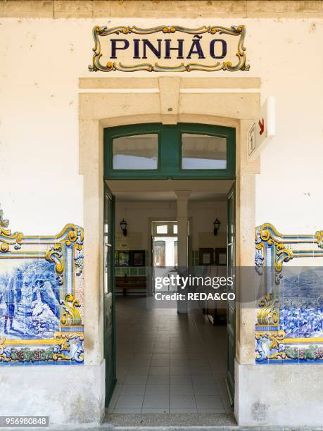 Pinhao railway station with typical blue Azulejos. The landmark of the village. The valley of river Douro. It is the wine growing area Alto Douro and...