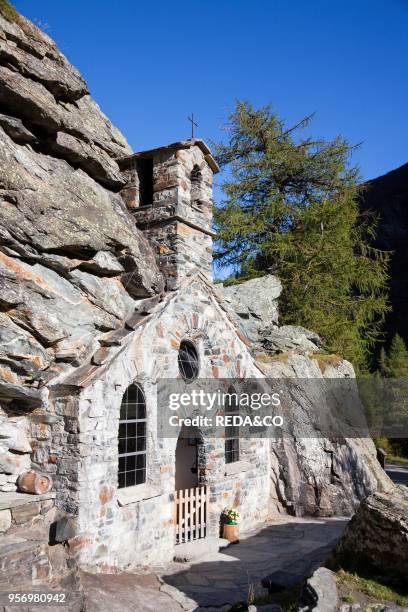 The Felsen Kapelle - Rock chapel. Gschloess valley. Tyrol. National Park Hohe Tauern. Exterior. Europe. Central Europe. Austria. East Tyrol.