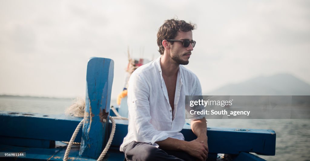 Young man on the boat