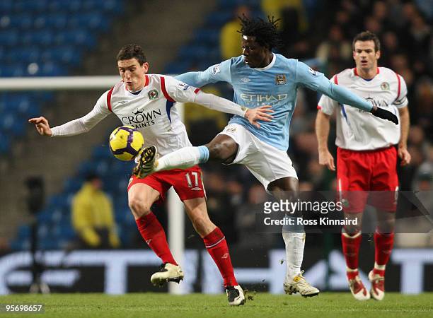 Benjani Mwaruwari of Manchester City battles for the ball with Keith Andrews of Blackburn Rovers during the Barclays Premier League match between...