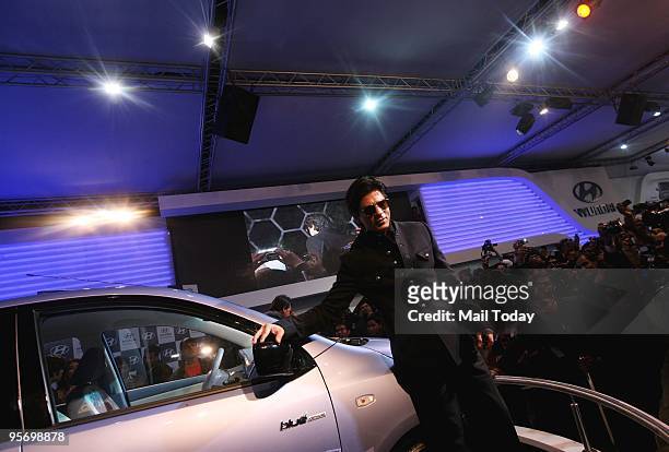 Superstar Shah Rukh Khan unveils the new Hyundai i10 electric car at the 10th Auto Expo in New Delhi on Wednesday, January 6, 2010.
