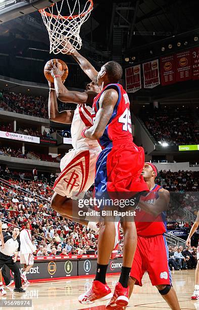 Jermaine Taylor of the Houston Rockets puts up a shot against Rasual Butler of the Los Angeles Clippers during the game on December 22, 2009 at the...