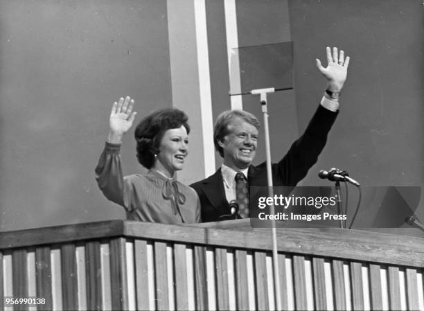 Jimmy Carter and wife Rosalynn Carter wave to the delegates at the 1977 Democratic National Convention after Carter was nominated to run for...