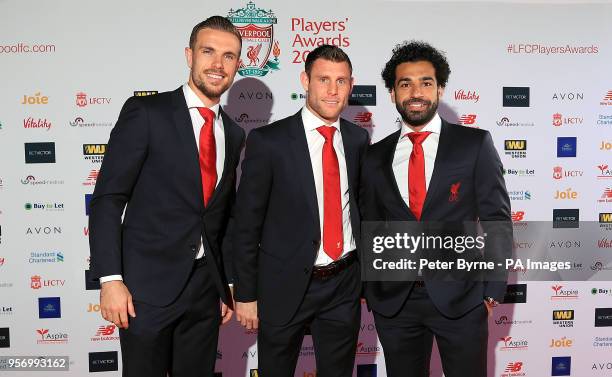 Liverpool's Jordan Henderson , James Milner and Mohamed Salah during the red carpet arrivals for the 2018 Liverpool Players' Awards at Anfield,...