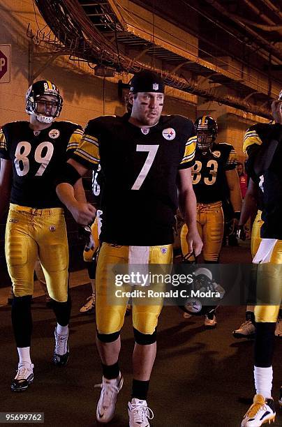 Quarterback Ben Roethlisberger, and Tight End Matt Spaeth of the Pittsburgh Steelers walk to the field before a NFL game against the Miami Dolphins...