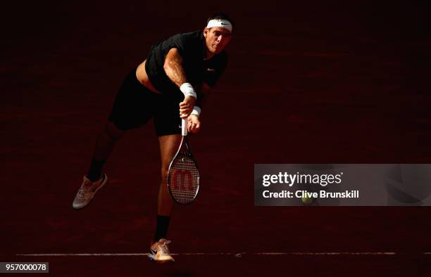 Juan Martin Del Potro of Argentina serves against Dusan Lajovic of Serbia in their third round match during day six of the Mutua Madrid Open tennis...