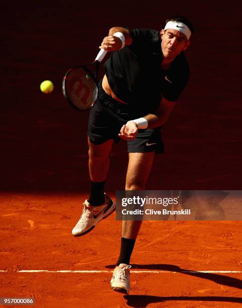 Juan Martin Del Potro of Argentina serves against Dusan Lajovic of Serbia in their third round match during day six of the Mutua Madrid Open tennis...