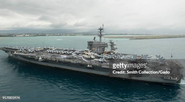Aircraft carrier USS Theodore Roosevelt arrives in Pearl Harbor, Hawaii, April 27, 2018. Image courtesy Petty Officer 3rd Class Jessica Blackwell /...