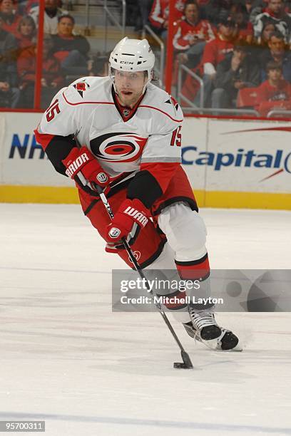 Tuomo Ruutu of the Carolina Hurricanes skates with the puck during a NHL hockey game against the Washington Capitals on December 28, 2009 at the...