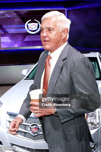 Bob Lutz, vice chairman of General Motors Co. , walks past a Cadillac display on day one of the 2010 North American International Auto Show in...