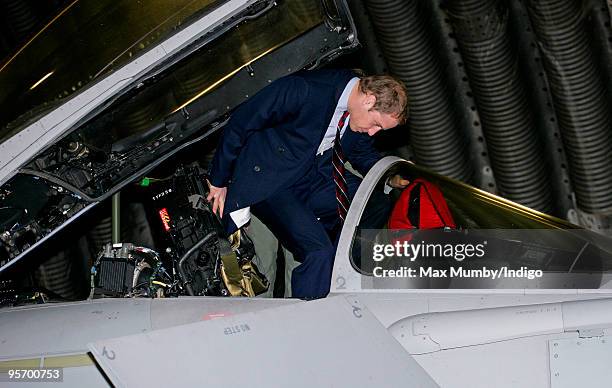 Prince William, Honorary Air Commandant of Royal Air Force Coningsby sits in the cockpit of a Typhoon jet during a visit to RAF Coningsby on January...