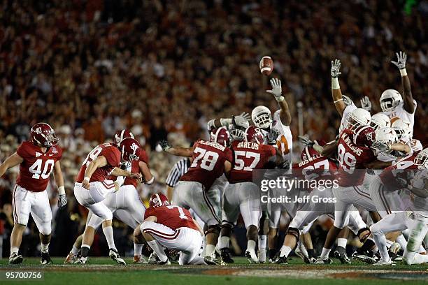 Kicker Leigh Tiffin of the Alabama Crimson Tide kicks a field goal against the Texas Longhorns in the Citi BCS National Championship game at the Rose...