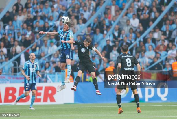 Jonas Olsson of Djurgardens IF and Markus Rosenberg of Malmo FF during the Swedish Cup Final between Djurgardens IF and Malmo FF at Tele2 Arena on...