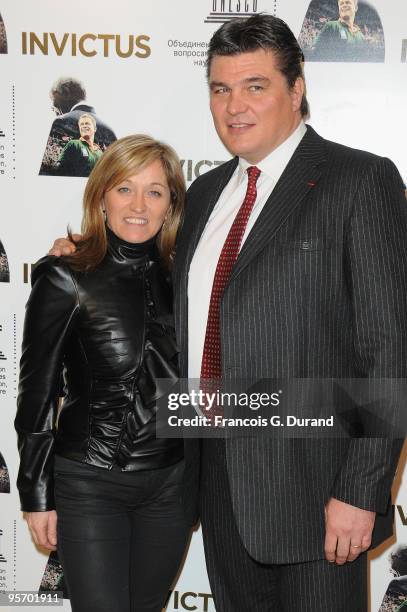 Athlete David Douillet and his wife Valerie Douillet attend the "Invictus" Paris premiere at UNESCO on January 11, 2010 in Paris, France.