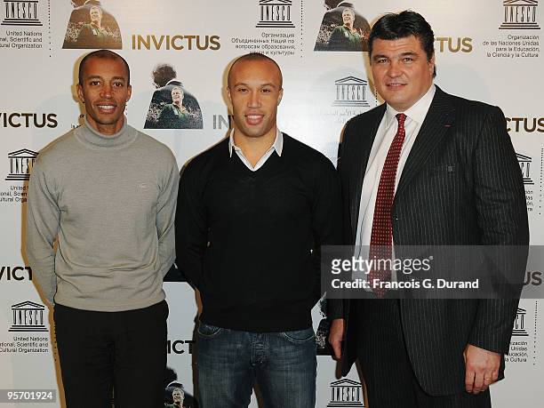 Former athlete Stephane Diagana, football defender Mickael Silvestre and athlete David Douillet attend the "Invictus" Paris premiere at UNESCO on...