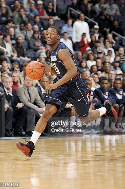 Kemba Walker of the University of Connecticut Huskies brings the ball up the court against the Georgetown Hoyas on January 9, 2010 at the Verizon...