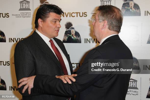 Athlete David Douillet and International Rugby Board Chairman Bernard Lapasset attend the "Invictus" Paris premiere at UNESCO on January 11, 2010 in...