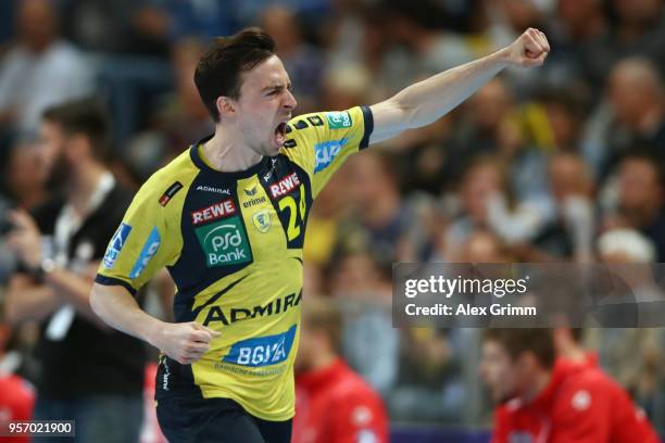 Patrick Groetzki of Rhein-Neckar Loewen celebrates a goal during the DKB HBL match between Rhein-Neckar Loewen and SC Magdeburg at SAP Arena on May...