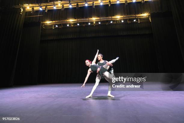 beautiful young ballet performers practicing before the show - men in motion dress rehearsal stock pictures, royalty-free photos & images