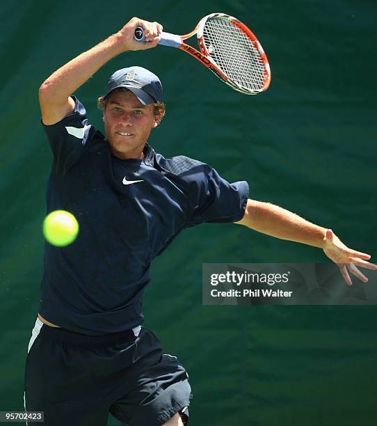 James Lemke of Australia plays a forehand in his first round match against Albert Montanes of Spain during day two of the Heineken Open at ASB Tennis...