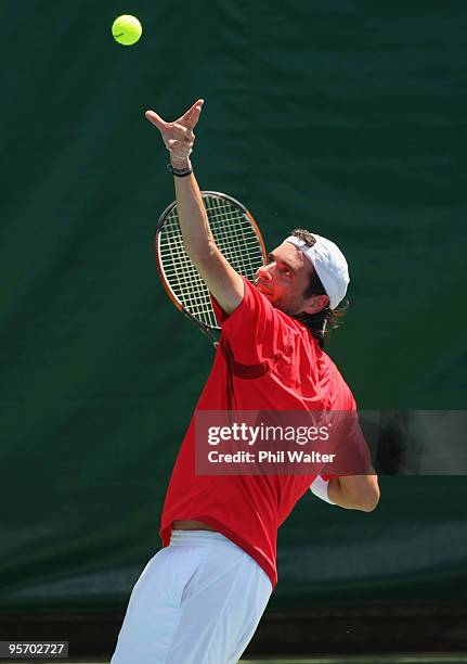 Albert Montanes of Spain serves in his first round match against James Lemke of Australia during day two of the Heineken Open at ASB Tennis Centre on...